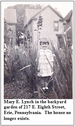 Text Box:  
Mary E. Lynch in the backyard garden of 217 E. Eighth Street, Erie, Pennsylvania.  The house no longer exists.
